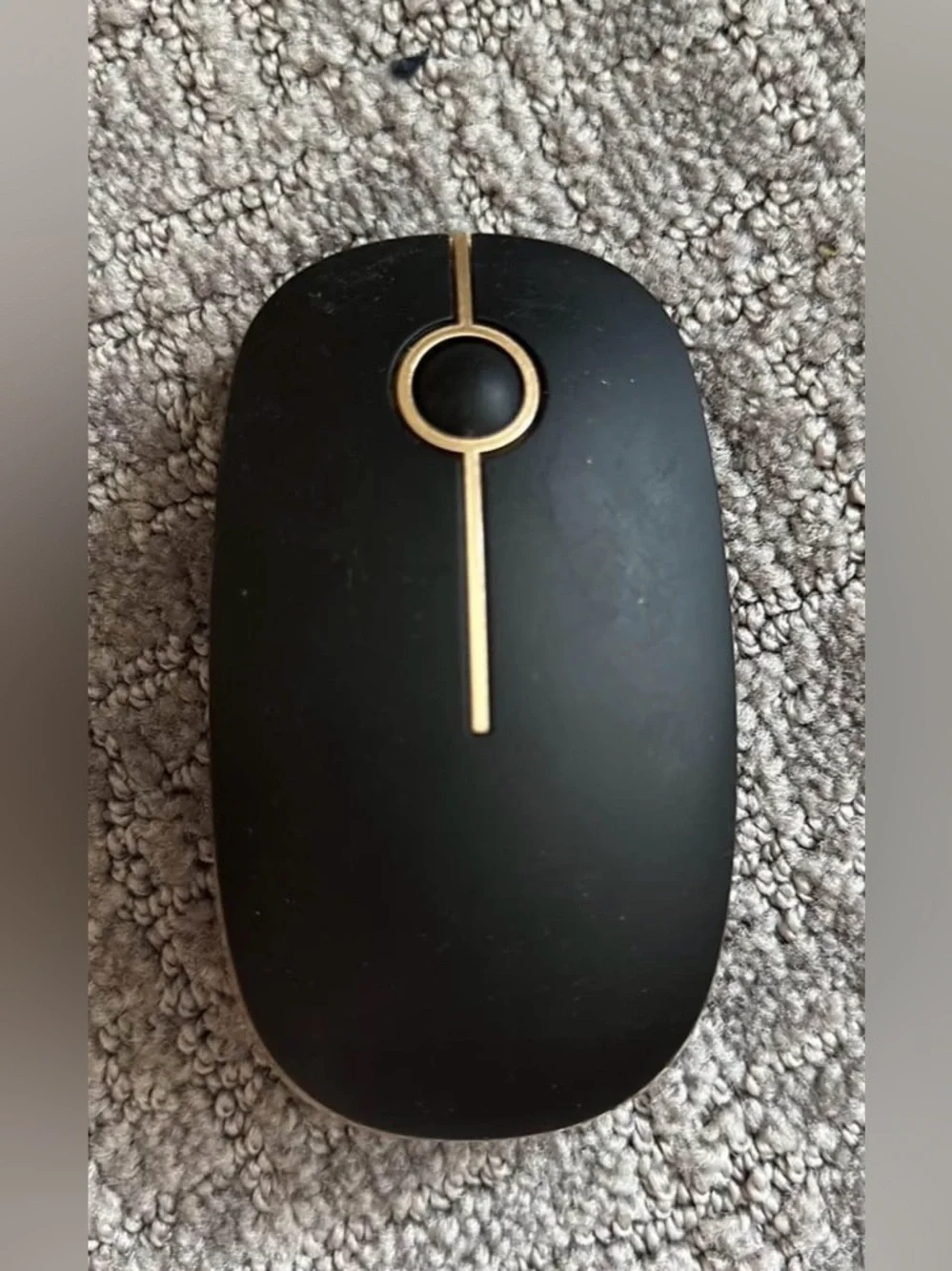 Sleek Black Wireless Mouse with Gold Accents